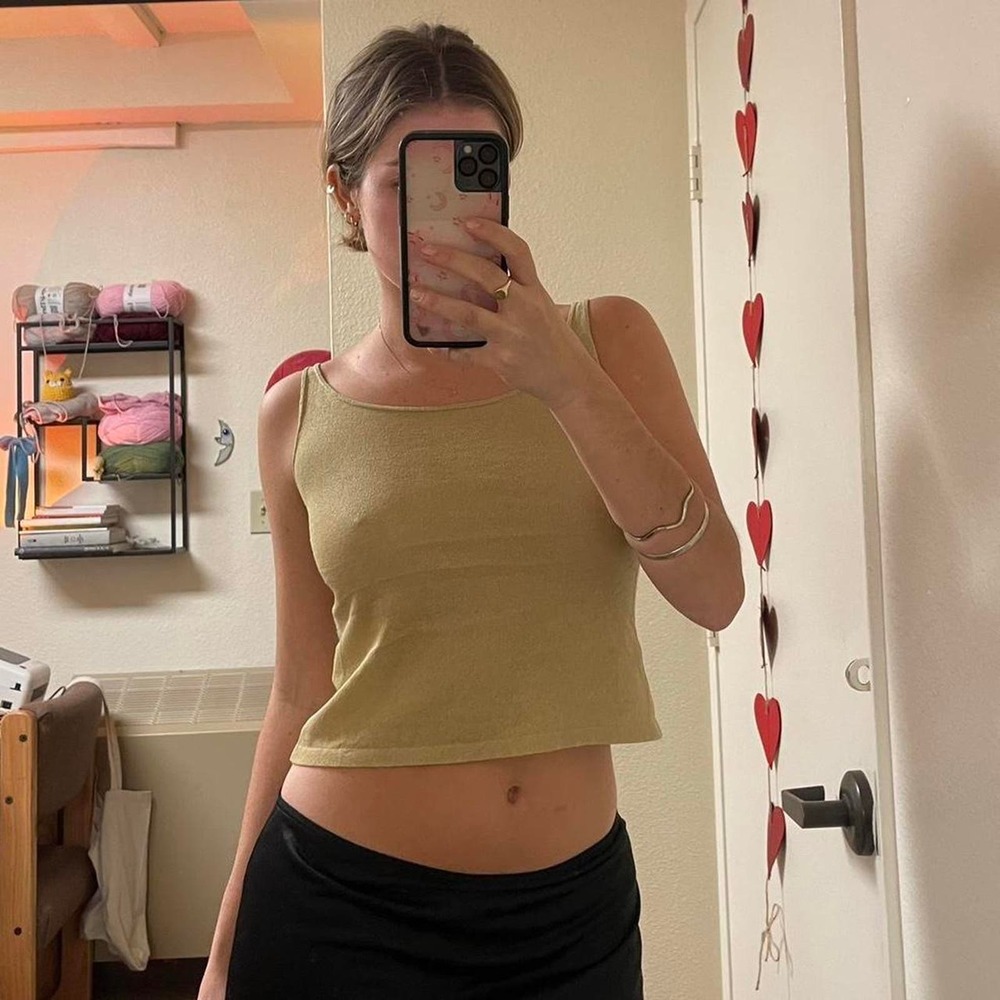 The gold fitted tank top